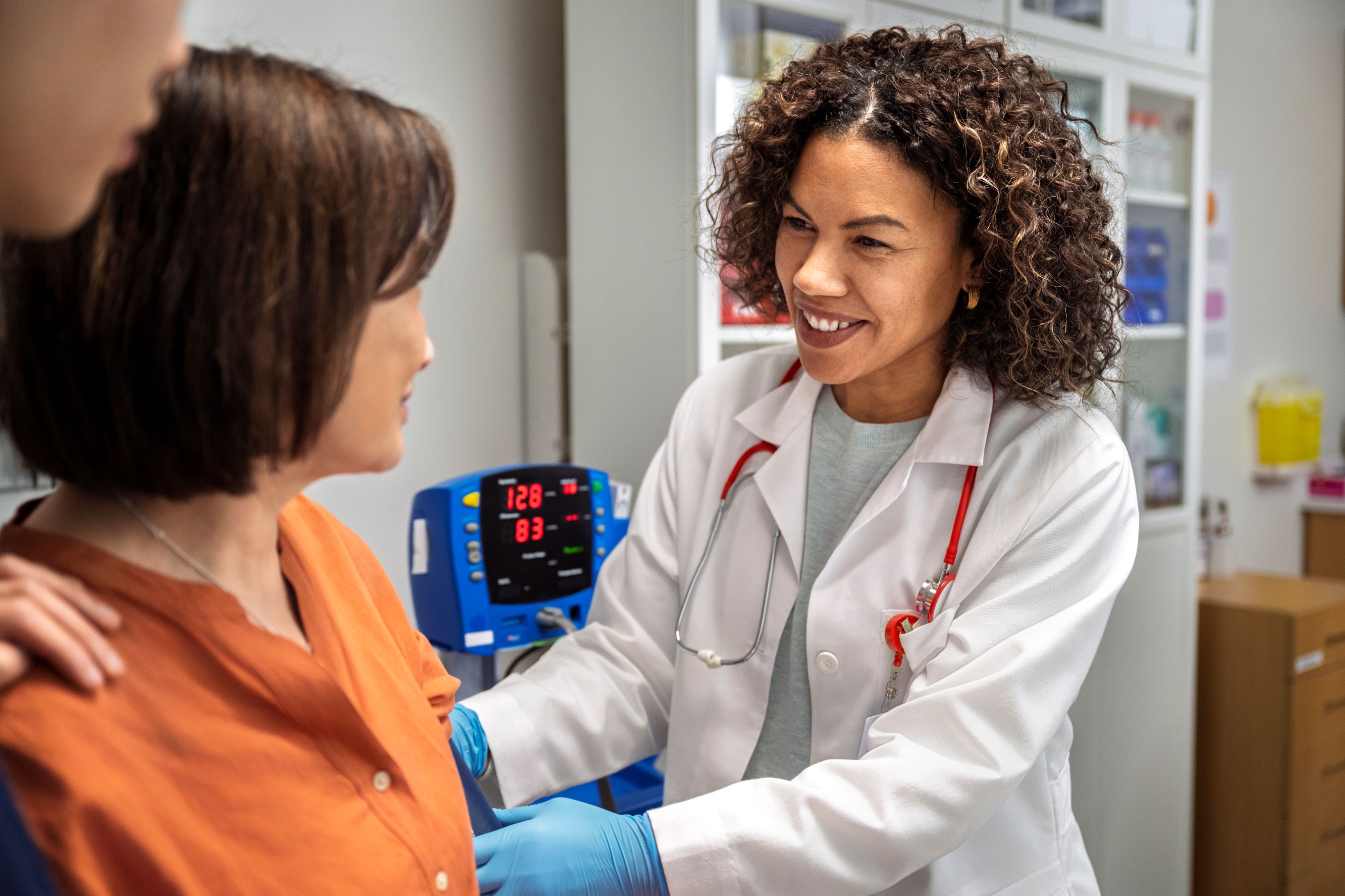 Image of a surgeon meeting with a patient