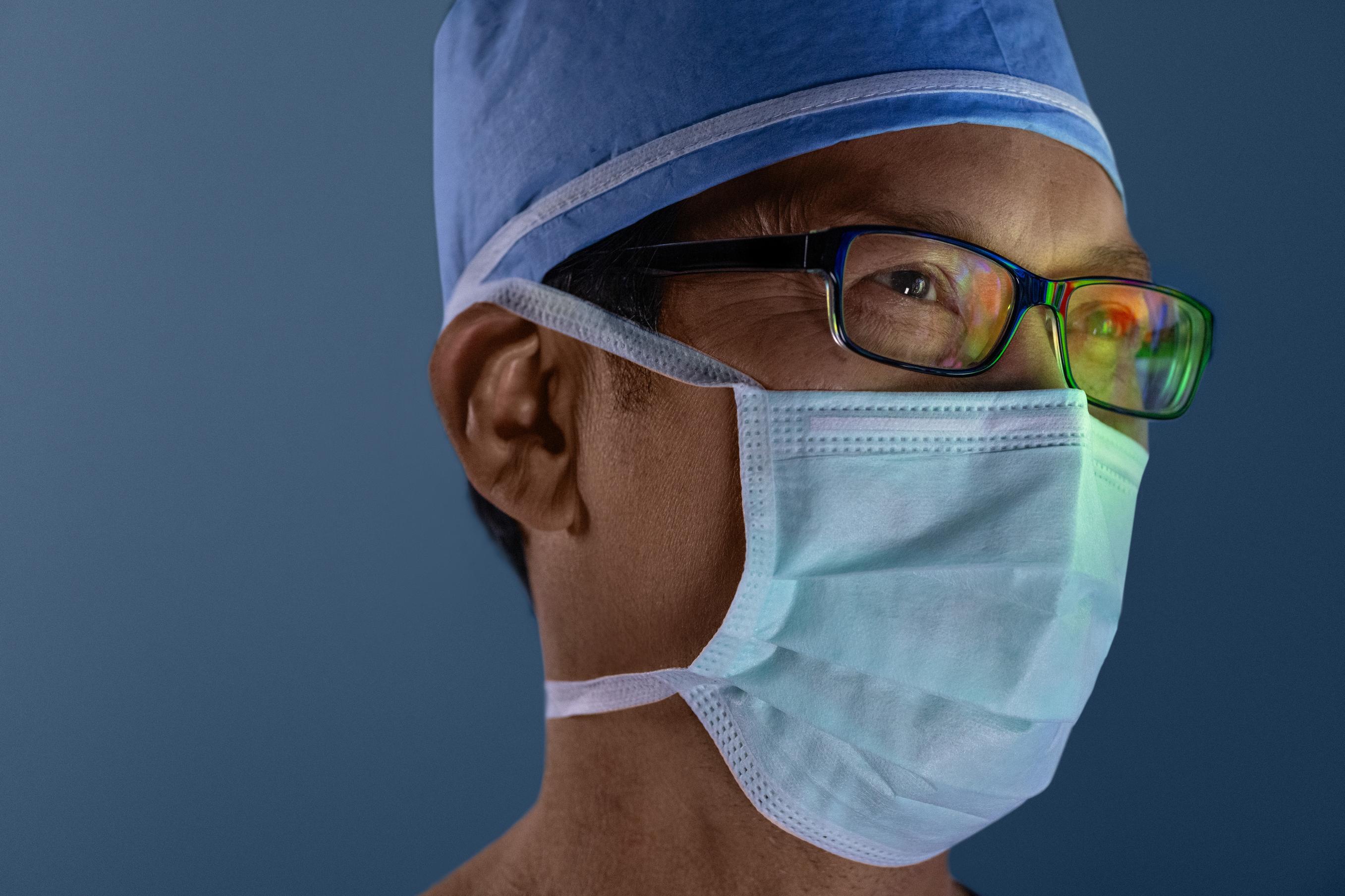 Image of a surgeon wearing glasses